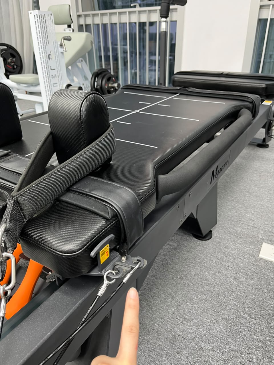 MegaCore Reformer — padded platform close-up